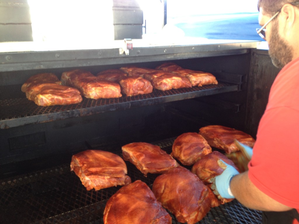 Cooking butts (pulled pork) for private dinner at our booth