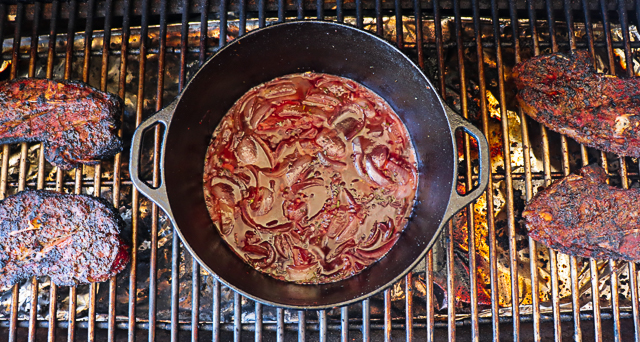 onions and seasoning in a cast iron skillet